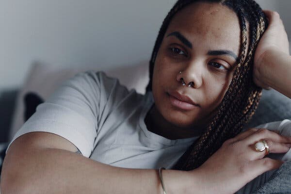 Saharra Dixon, who has trichotillomania, said protective hairstyles like braids help to prevent her fingers from reaching her natural hair. She still pulls from her eyelashes and eyebrows. “If I could stop, I would,” she said. “I’ve tried.”Credit...Tony Luong for The New York Times